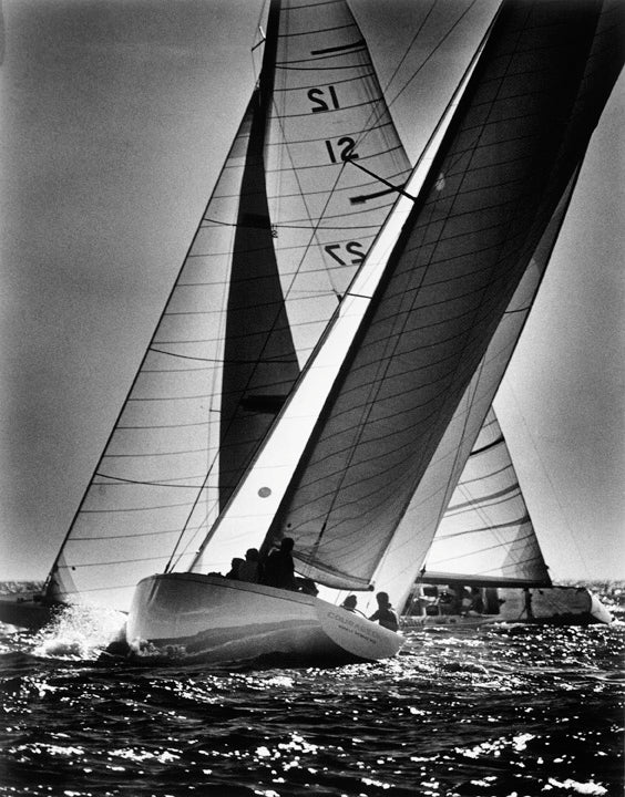 ENTERPRISE and COURAGEOUS, 1977 <br /> ENTERPRISE, the new yacht built for the series, crosses the bow of Ted Turner's COURAGEOUS in a long tacking duel to the windward mark.