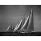 AT THE START, 1937 <br />An unforgettable moment in yachting history. Five of the 135-foot class J sloops with their 160-foot masts hit the starting line. From windward: Endeavor I, Rainbow, Ranger, Endeavor II, and Yankee.